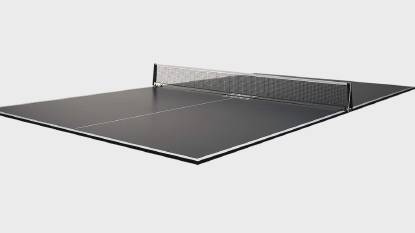JOOLA Conversion Table Tennis Table Top Backing in use on a flat surface
